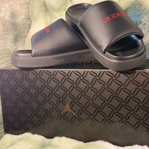 Air Jordan Black Slides with Red Logo
